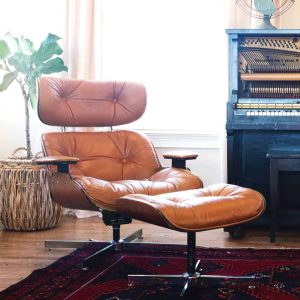 Orange recliner with leg rest